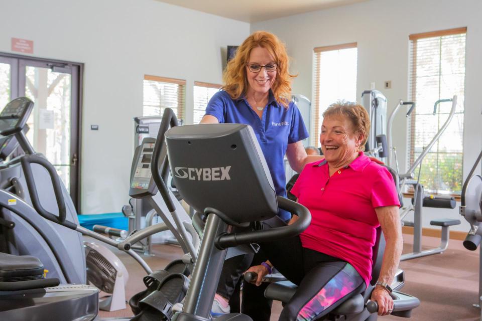 Woman Resident working with Physical therapist at Eskaton Village Roseville Onsite Gym