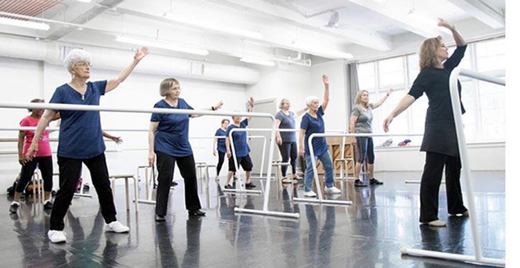 Older adults taking ballet lessons
