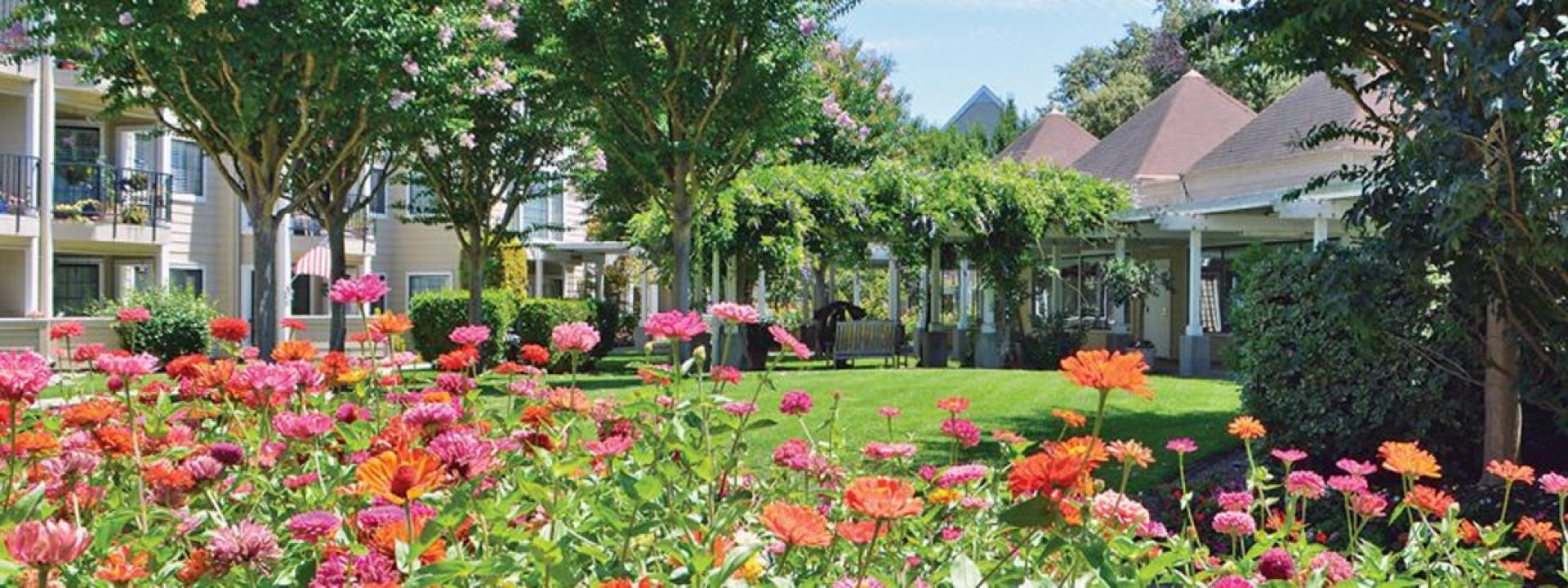 O'Connor Woods apartments and beautiful flower garden
