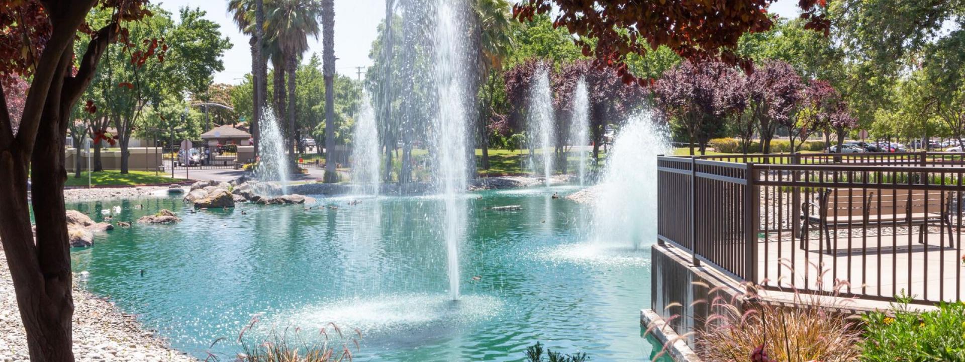 Continuing Care Retirement Community CCRC Sacramento - Beautiful Eskaton Village Carmichael with pond, fountains, and outdoor deck