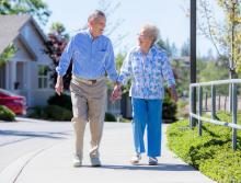 Residents couple walking the beautiful grounds at Eskaton Village Grass Valley.
