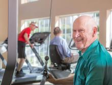 Residents working out in the community gym.