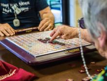 Residents playing Scrabble