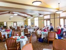 Residents eating dinner in the dining room