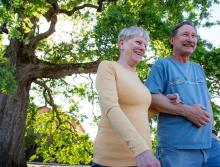 A happy couple taking a walk, arm-in-arm