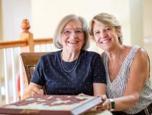 Mother and daughter playing a game of scrabble