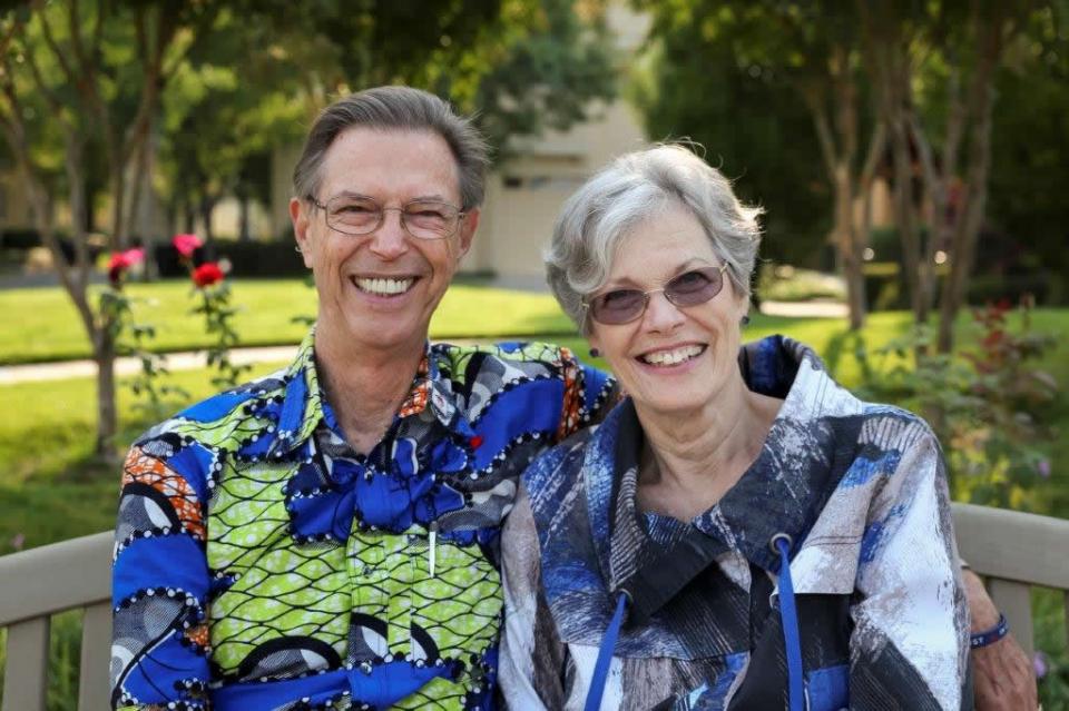 Age Is Beautiful Virgil and Lynn Nelson sitting on a bench, smiling 