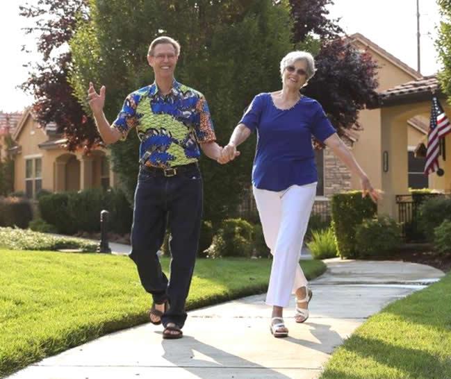 Age Is Beautiful Virgil and Lynn Nelson sitting taking a walk