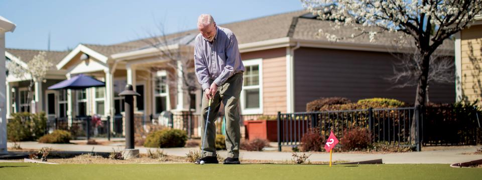 Man playing golf