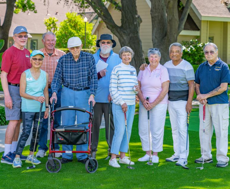 Group of residents golfing