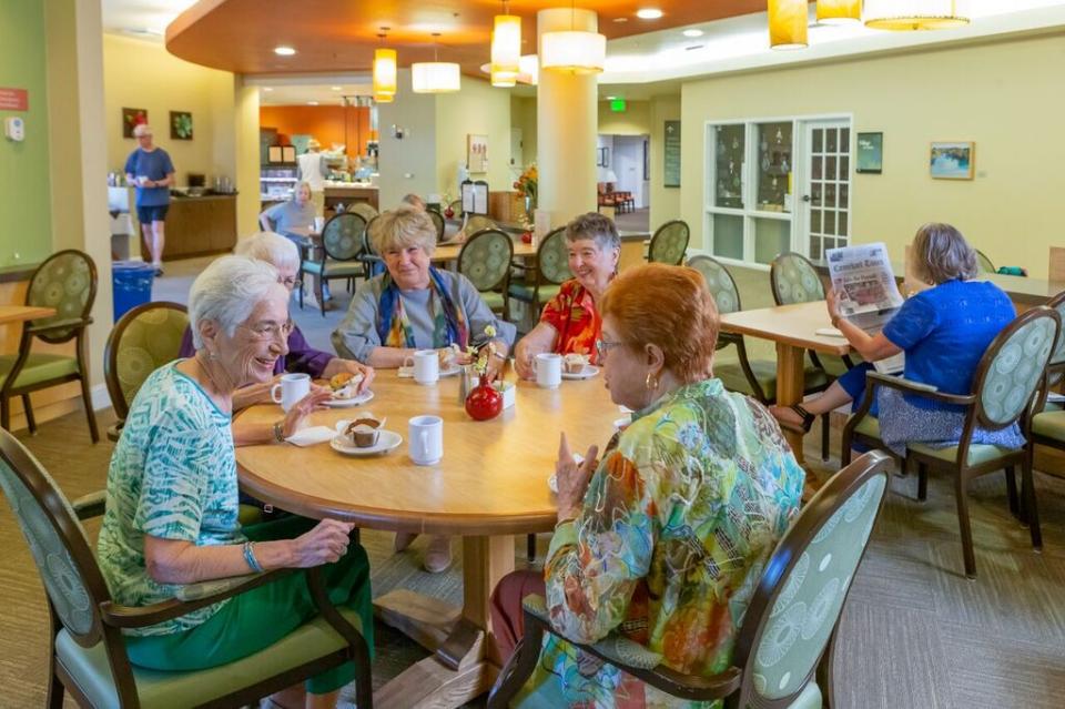 A group of women socializing at the community Bistro
