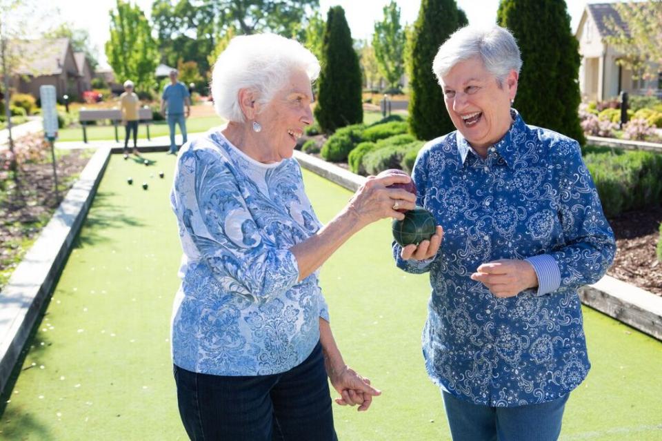 Four residents playing Bocce ball