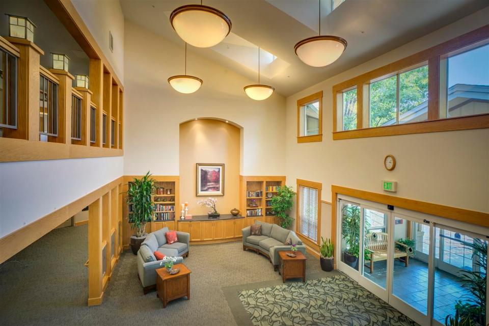 Front lobby area with couches and tables,
