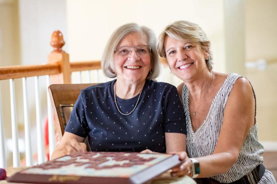 Mother and daughter playing a game of scrabble