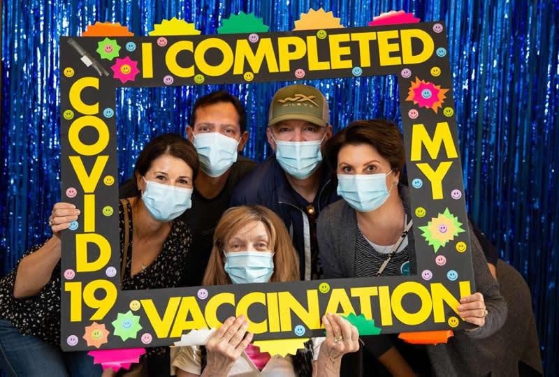 Eskaton employee receiving COVID vaccine