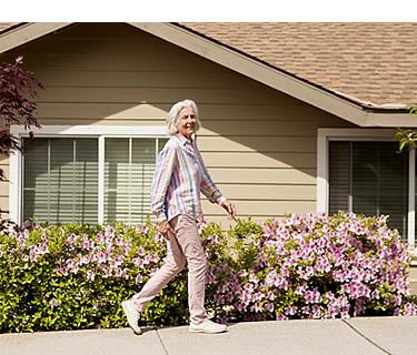 Resident taking a walk around the community
