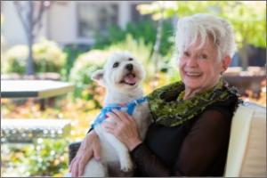 Woman holding Dog