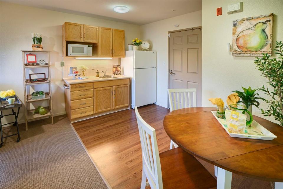 Apartment kitchenette and dining room area.