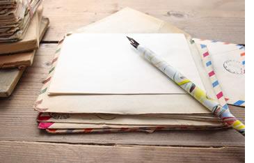 Paper, pen and envelope for writing a letter