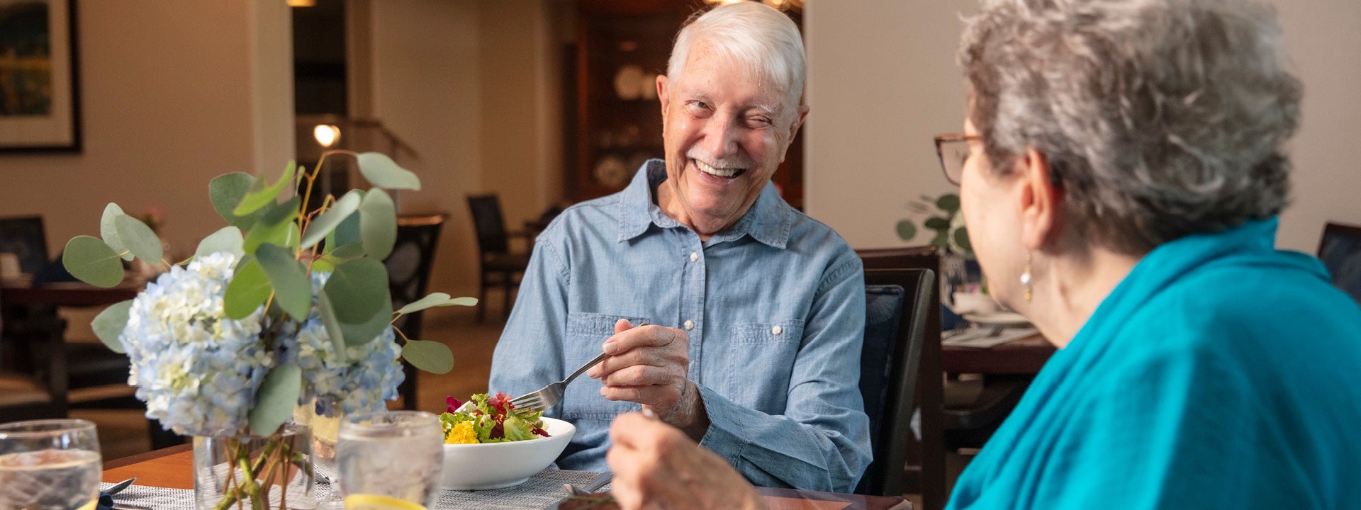 Land Park Couple Having a conversation over a meal