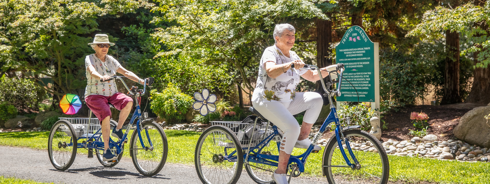 Residents riding on a bike